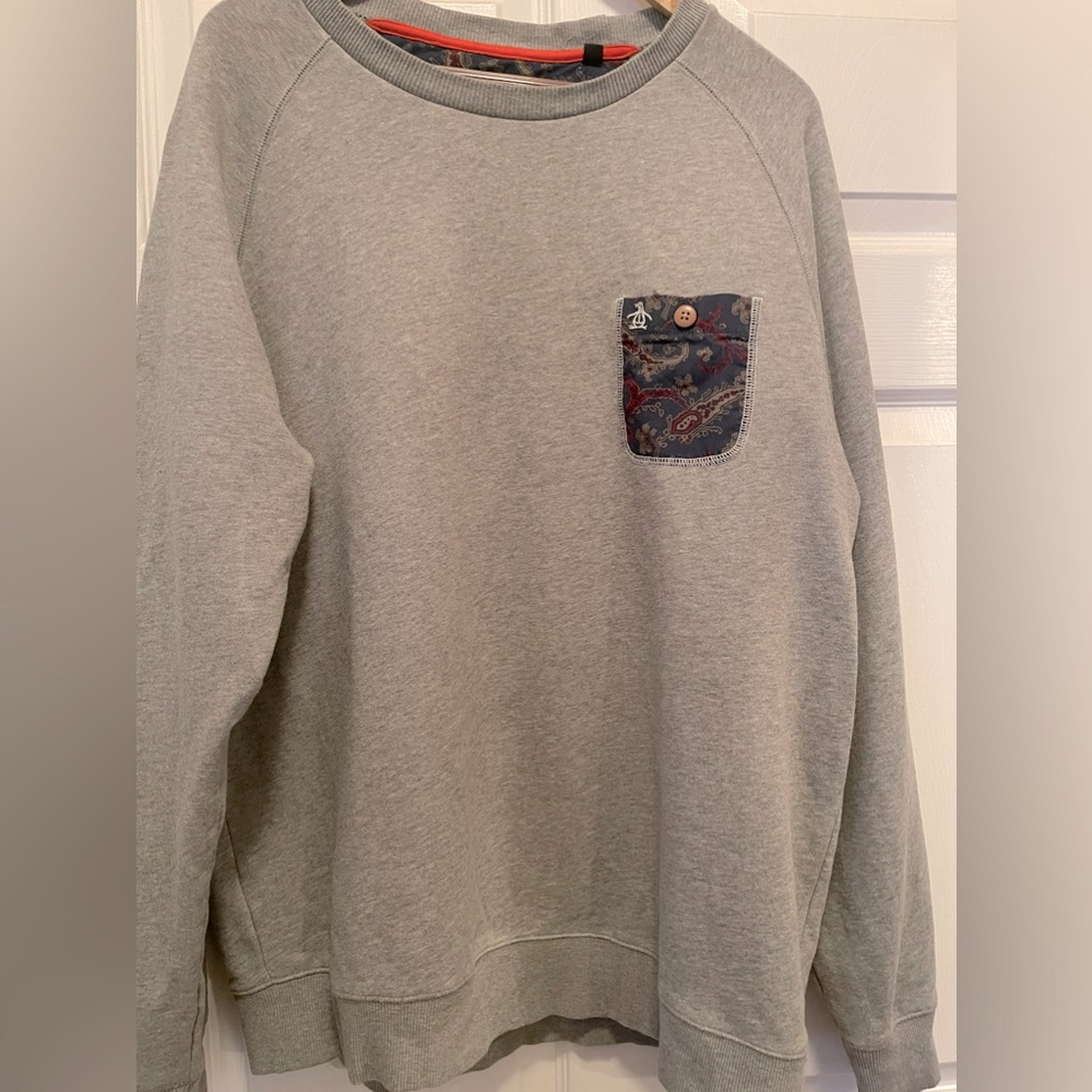 I’m selling a Penguin sweatshirt in excellent condition